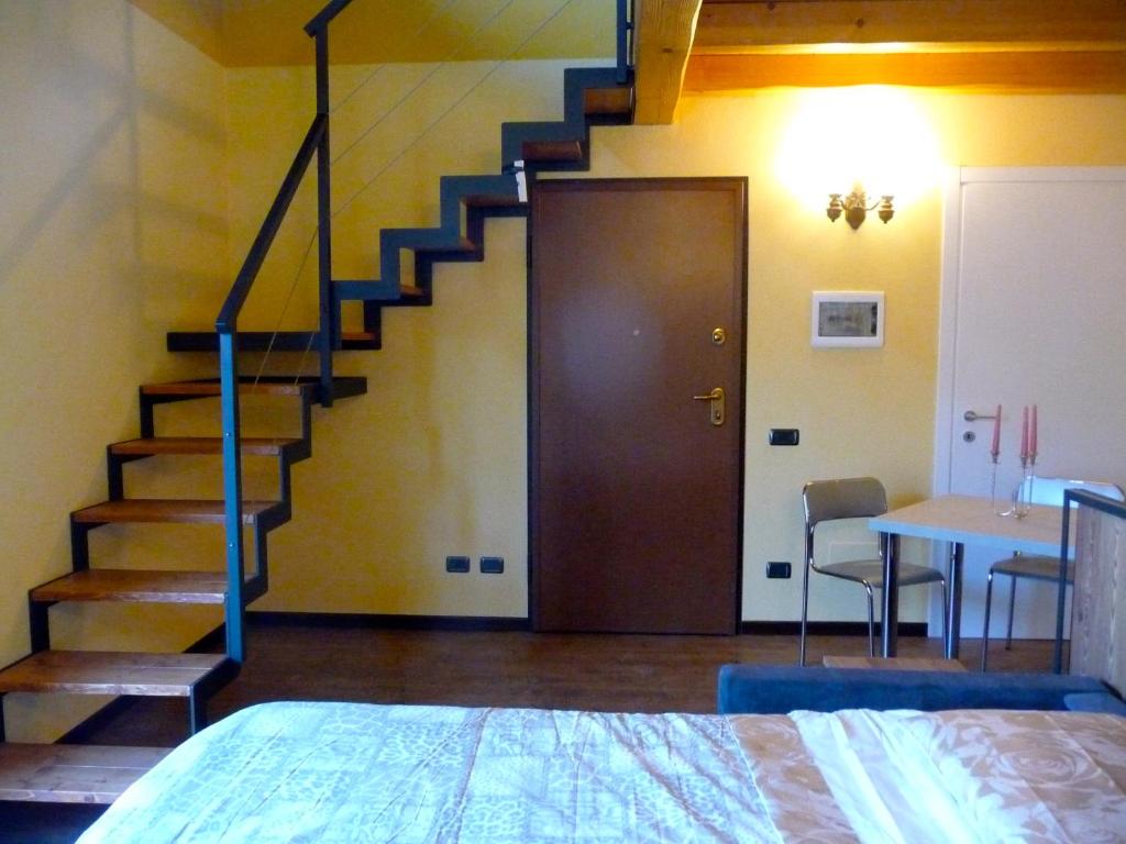 Postel nebo postele na pokoji v ubytování Tra Lago e Montagna Baita la Morena