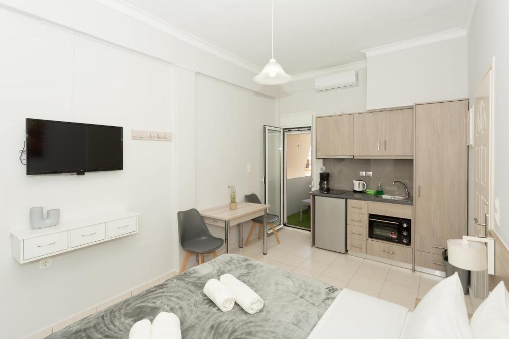 Kuchyň nebo kuchyňský kout v ubytování Eleni Apartments