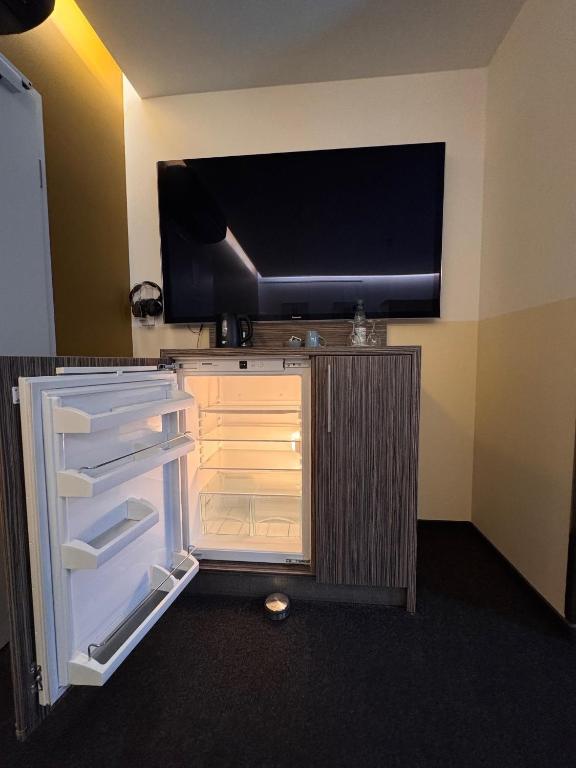 Kuchyň nebo kuchyňský kout v ubytování Apart Hotel Fulda