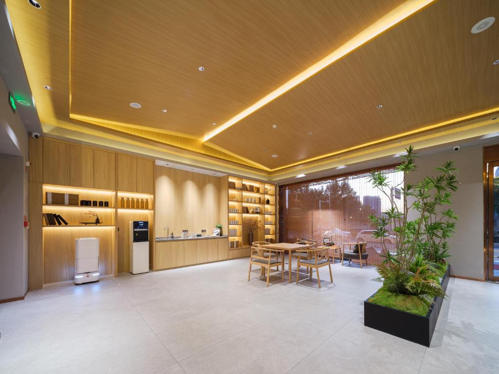 Posezení v ubytování 桔作酒店（郑州经开中原福塔东地铁站店）