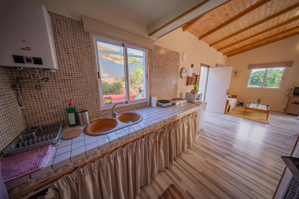 Kuchyň nebo kuchyňský kout v ubytování Casa Rural Buda Terra