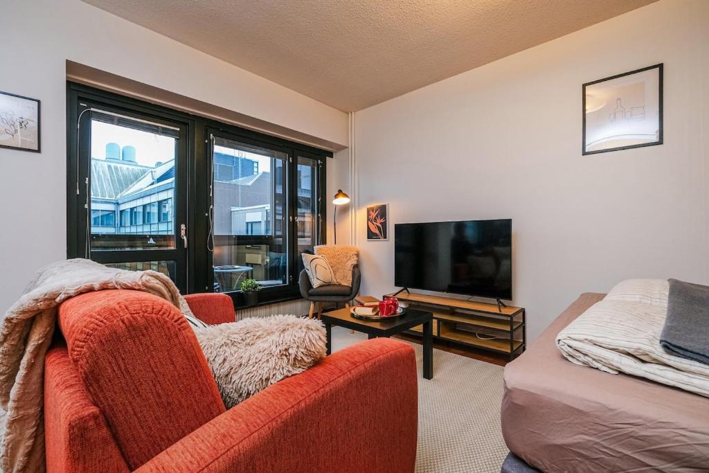 TV a/nebo společenská místnost v ubytování Unique Studio Central Helsinki