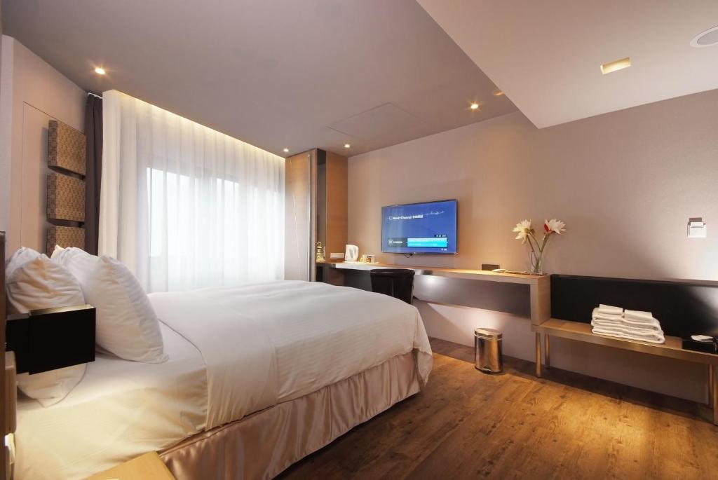 Postel nebo postele na pokoji v ubytování Guest Hotel