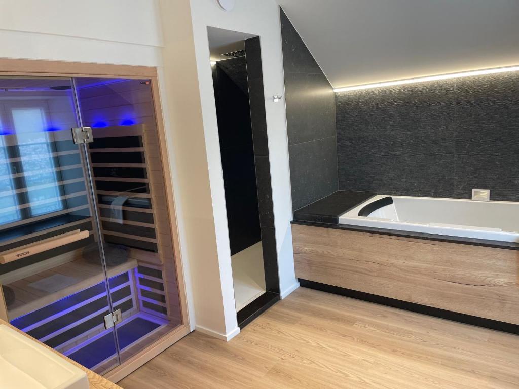 Postel nebo postele na pokoji v ubytování Hotel Le Charme de la Semois