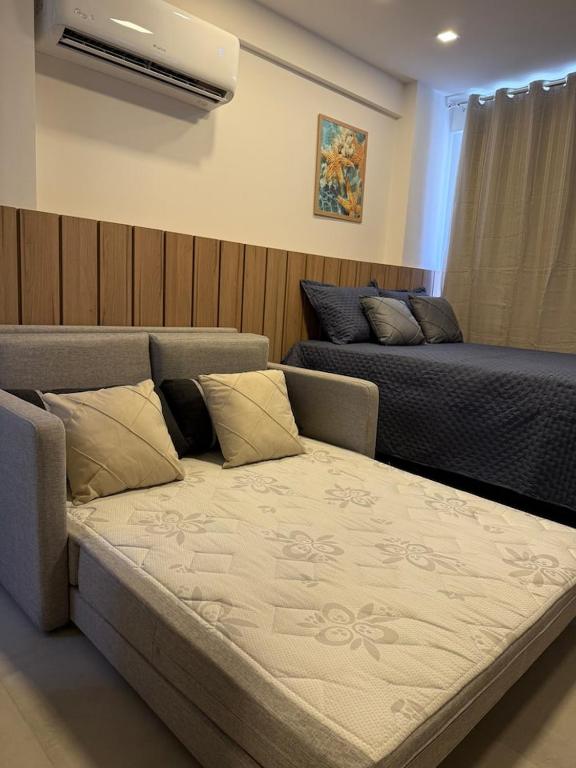 Postel nebo postele na pokoji v ubytování Flat a poucos metros do mar