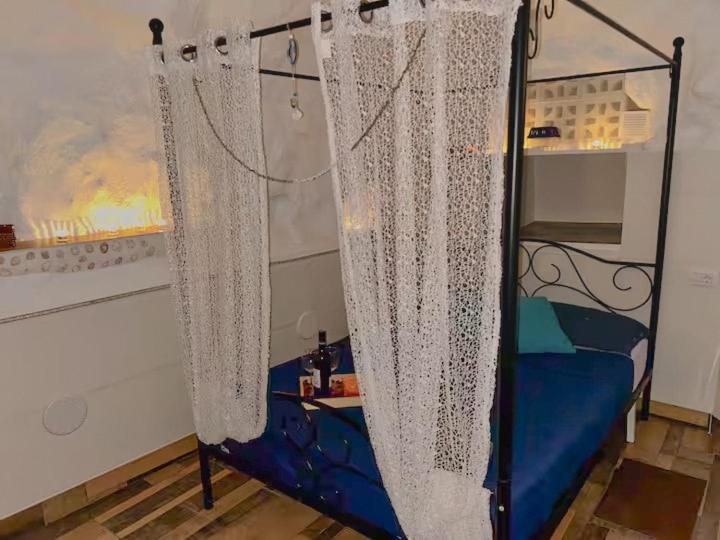Postel nebo postele na pokoji v ubytování Cueva relajante con playa solitaria