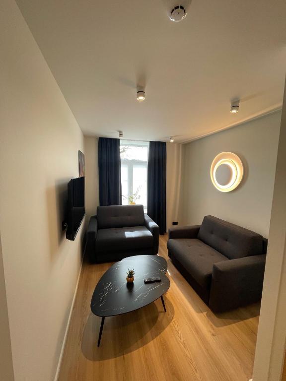 Posezení v ubytování Hotel Le Charme de la Semois