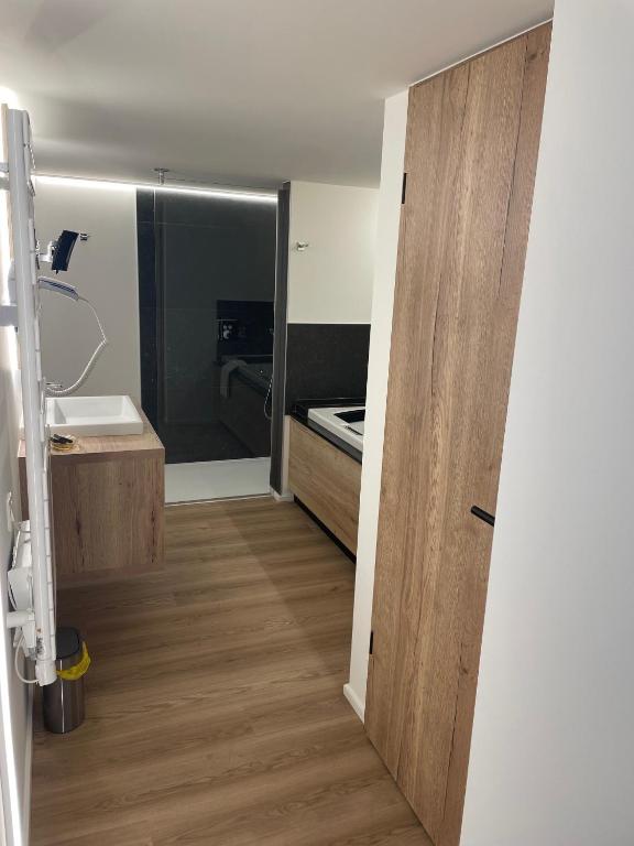 Kuchyň nebo kuchyňský kout v ubytování Hotel Le Charme de la Semois
