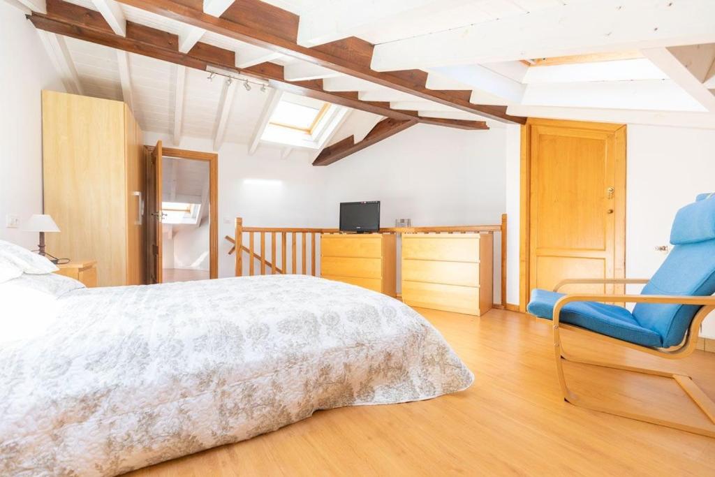 A bed or beds in a room at El Peregrino Llanes VUT