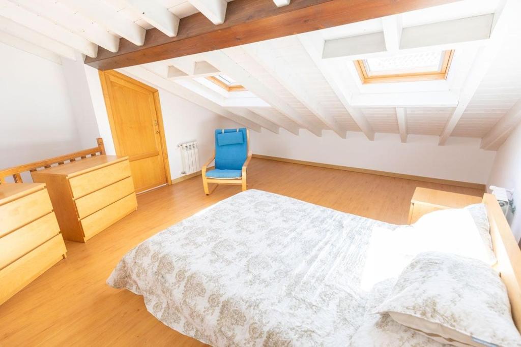 A bed or beds in a room at El Peregrino Llanes VUT