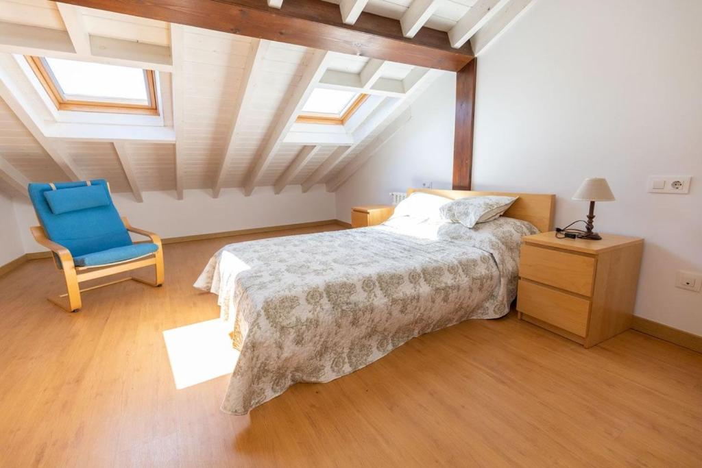 A bed or beds in a room at El Peregrino Llanes VUT