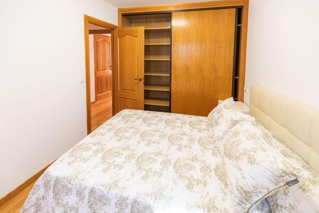 A bed or beds in a room at El Peregrino Llanes VUT