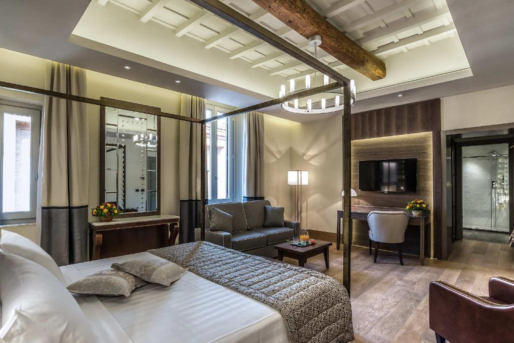 TV a/nebo společenská místnost v ubytování Hotel Martis Palace