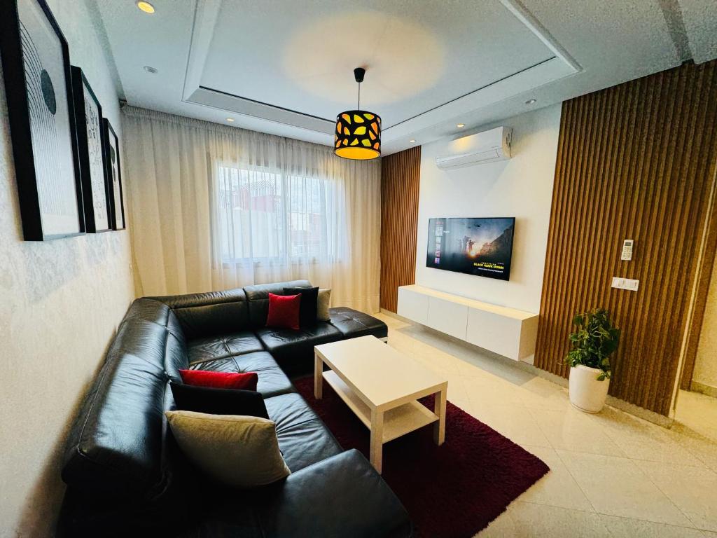 Een zitgedeelte bij Modern Apartment in the heart of Tangier