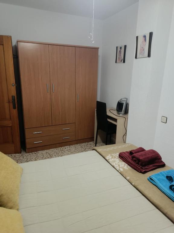 Postel nebo postele na pokoji v ubytování Casa EL CASTILLO ,a 5 kilómetros de la playa