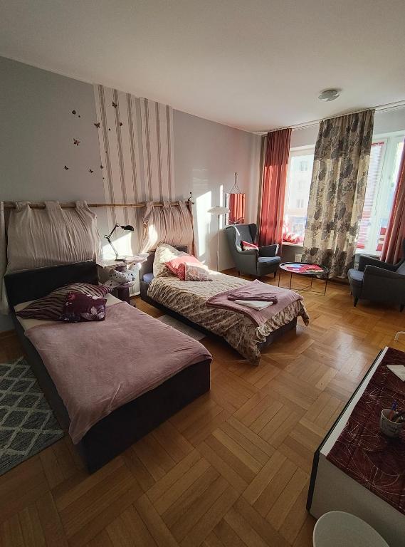 Postel nebo postele na pokoji v ubytování ToTuToTam