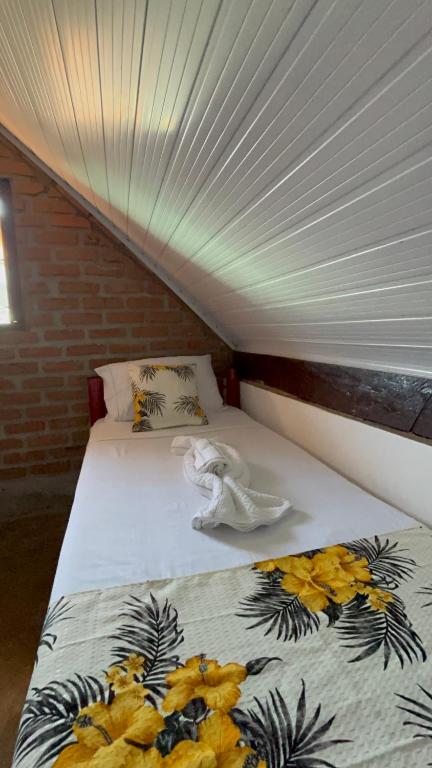 Postel nebo postele na pokoji v ubytování Cacau Biruta
