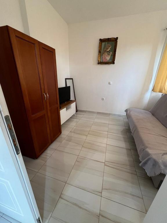 Postel nebo postele na pokoji v ubytování Apartments Bettii