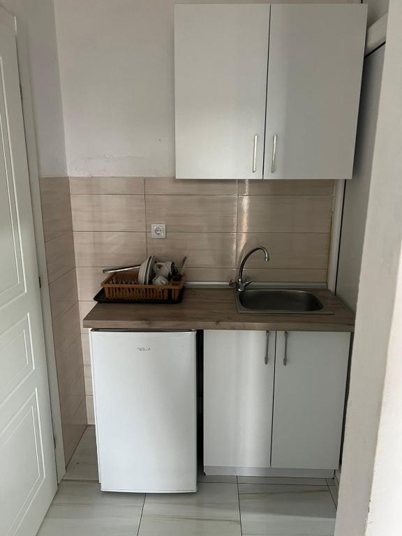 Kuchyň nebo kuchyňský kout v ubytování Apartments Bettii