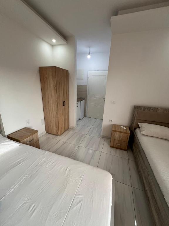 Postel nebo postele na pokoji v ubytování Apartments Bettii