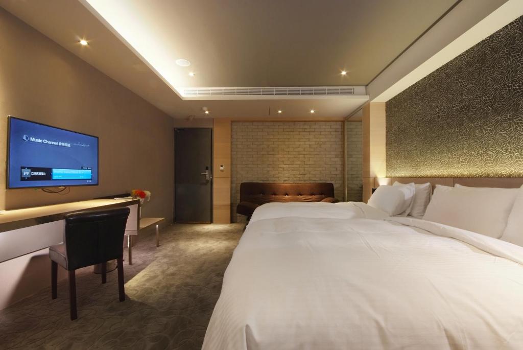 TV a/nebo společenská místnost v ubytování Guest Hotel