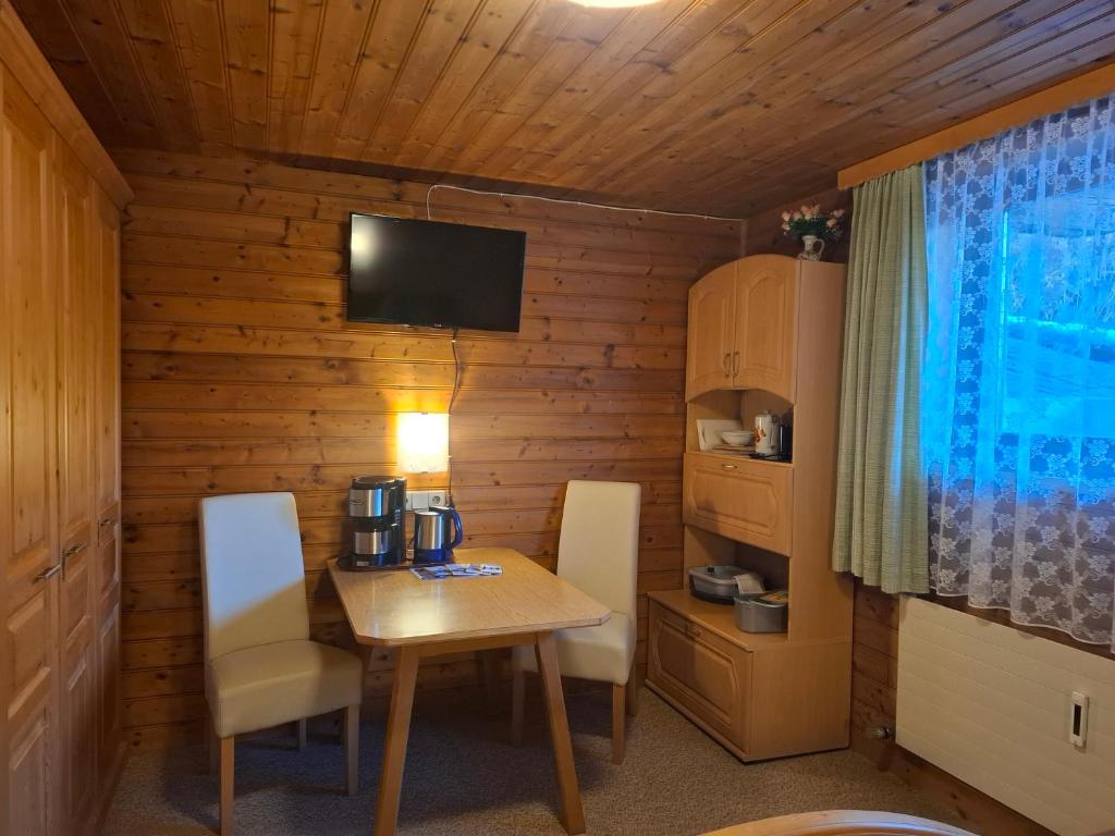 TV a/nebo společenská místnost v ubytování Haus Fichtenblick