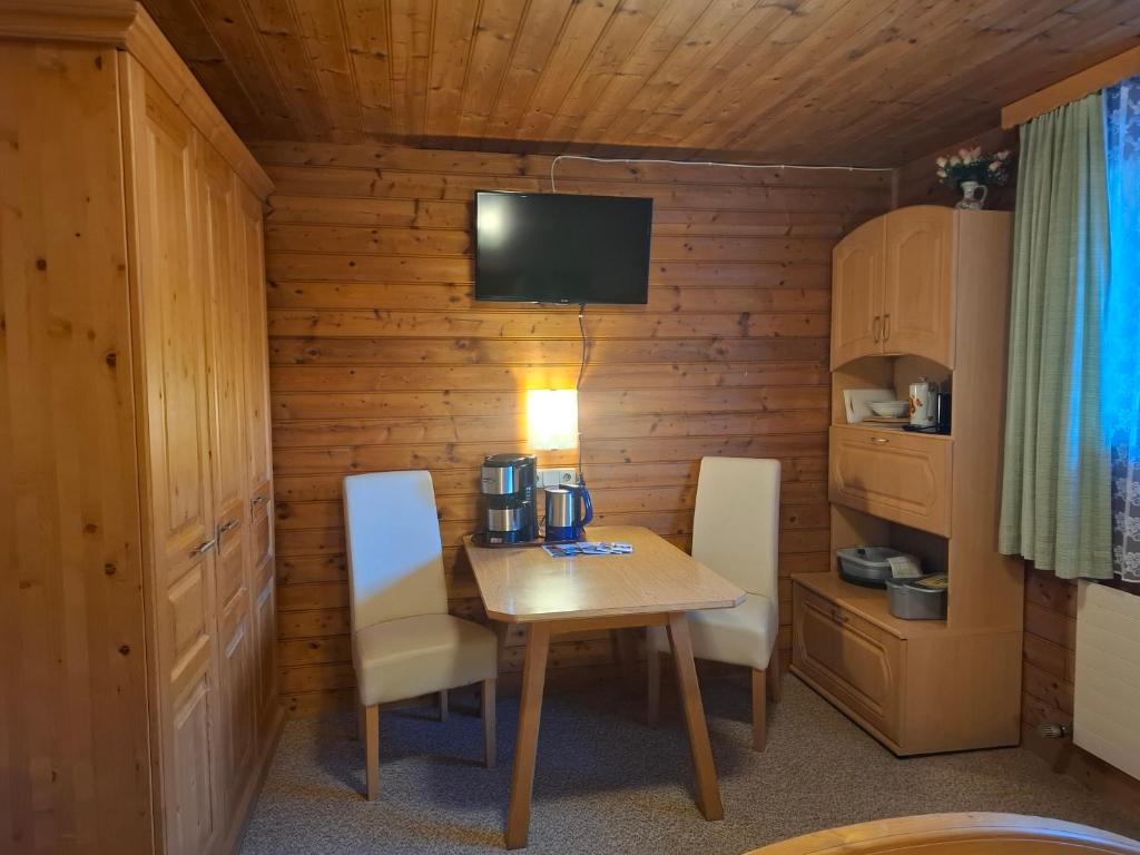 TV a/nebo společenská místnost v ubytování Haus Fichtenblick