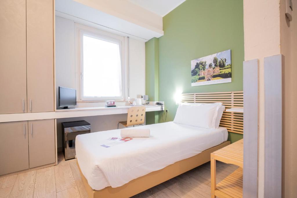 Postel nebo postele na pokoji v ubytování Best Quality Hotel Gran Mogol