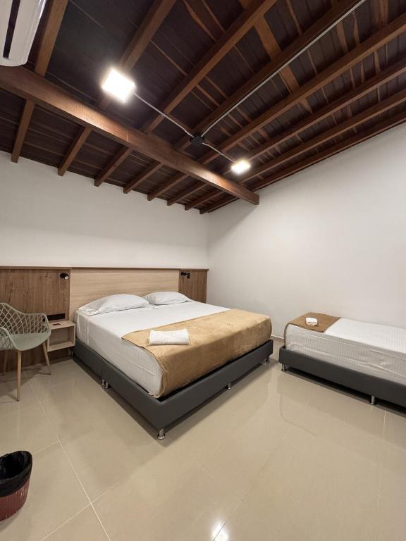 Postel nebo postele na pokoji v ubytování Vida Hostel