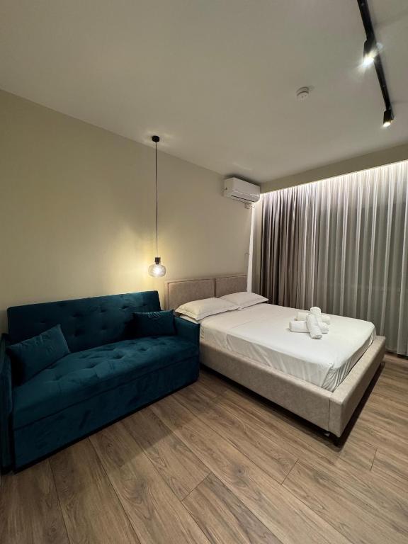 Postel nebo postele na pokoji v ubytování Alcazar Luxury Suites