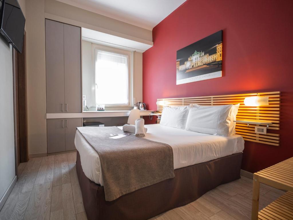 Postel nebo postele na pokoji v ubytování Best Quality Hotel Gran Mogol