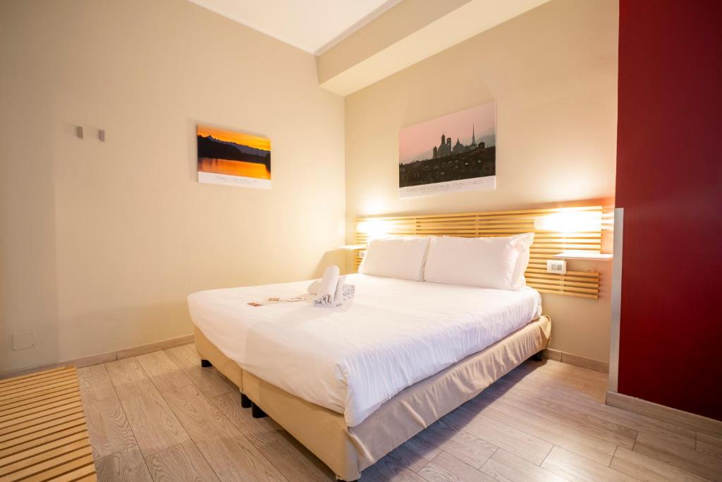Postel nebo postele na pokoji v ubytování Best Quality Hotel Gran Mogol