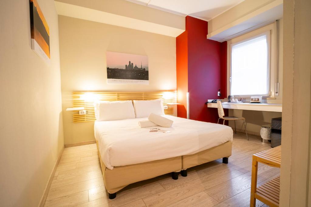 Postel nebo postele na pokoji v ubytování Best Quality Hotel Gran Mogol