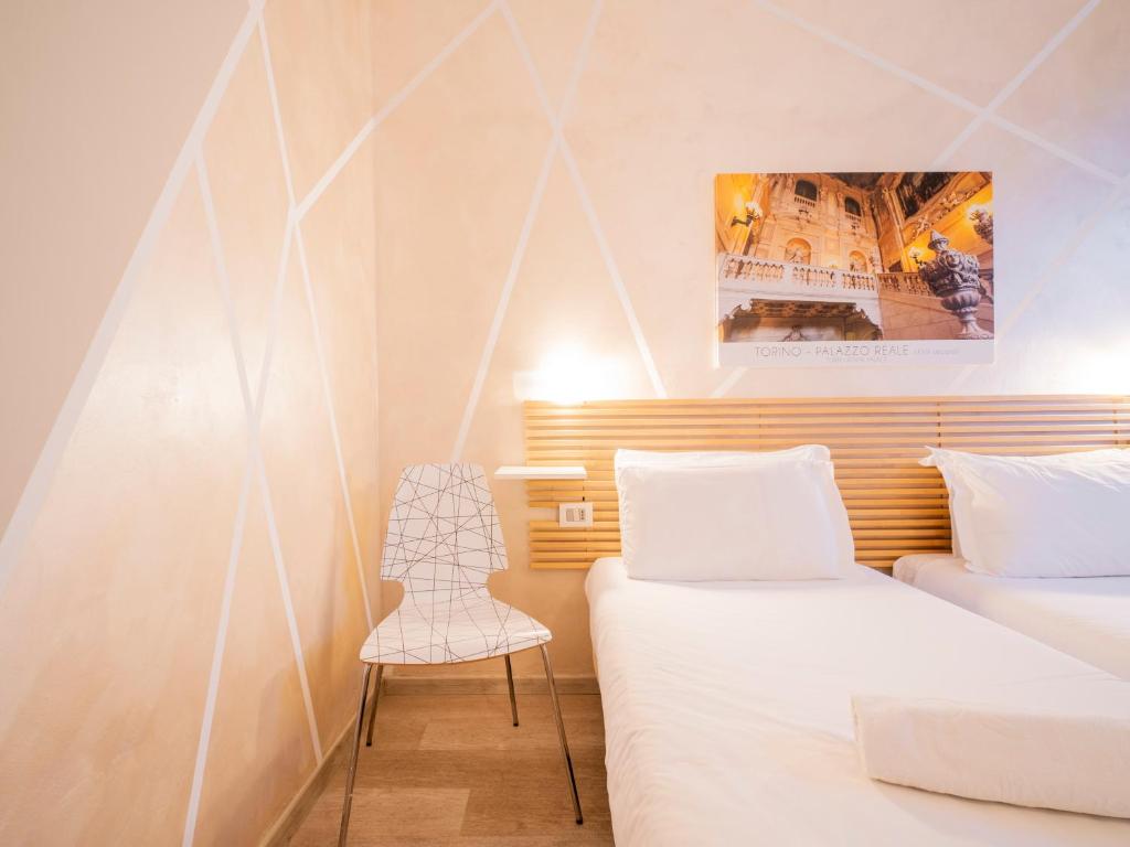Postel nebo postele na pokoji v ubytování Best Quality Hotel Gran Mogol