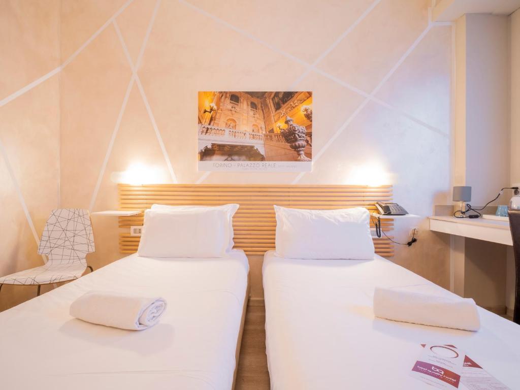 Postel nebo postele na pokoji v ubytování Best Quality Hotel Gran Mogol