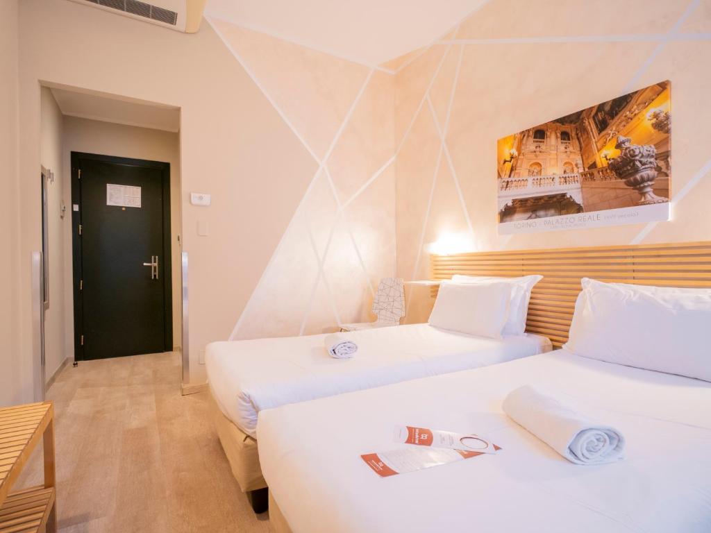 Postel nebo postele na pokoji v ubytování Best Quality Hotel Gran Mogol