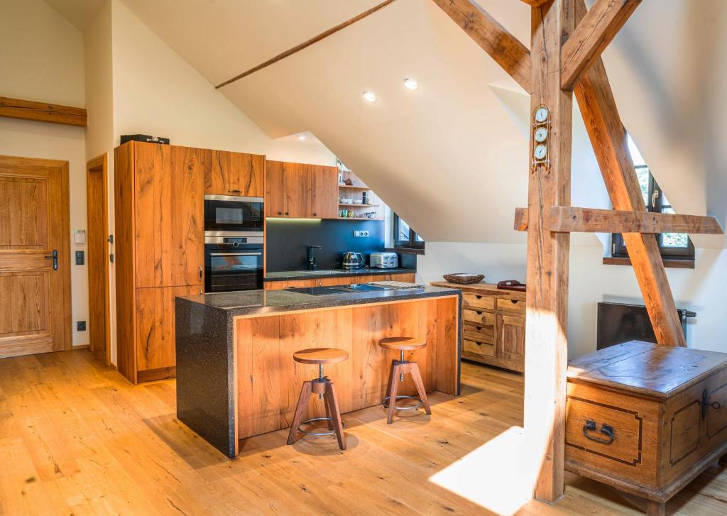 Kuchyň nebo kuchyňský kout v ubytování Apartmán Delux - Pihel