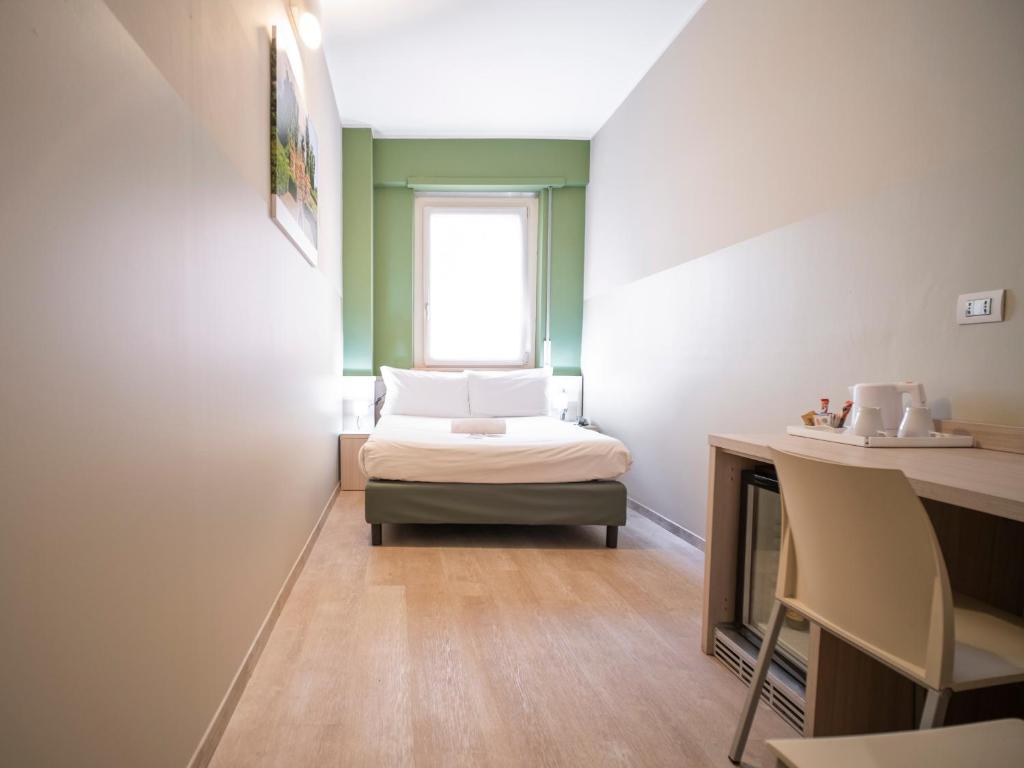 Postel nebo postele na pokoji v ubytování Best Quality Hotel Gran Mogol