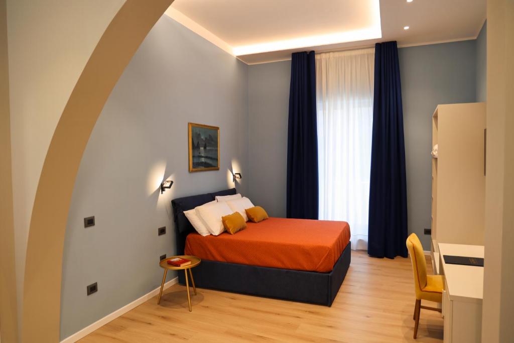 Ένα ή περισσότερα κρεβάτια σε δωμάτιο στο Home 109 Luxury Rooms