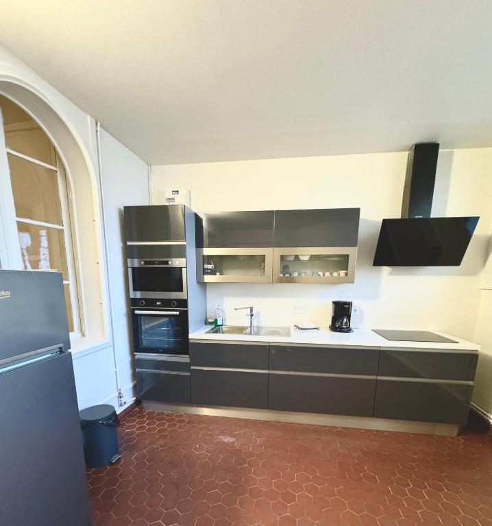Kuchyň nebo kuchyňský kout v ubytování ALBI Chambres