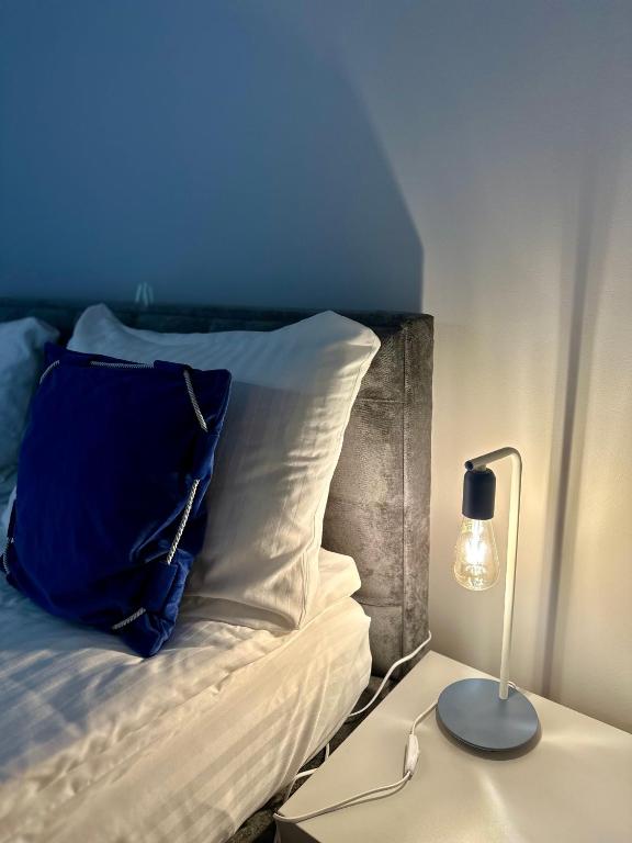 Posteľ alebo postele v izbe v ubytovaní Cobalt Apartments