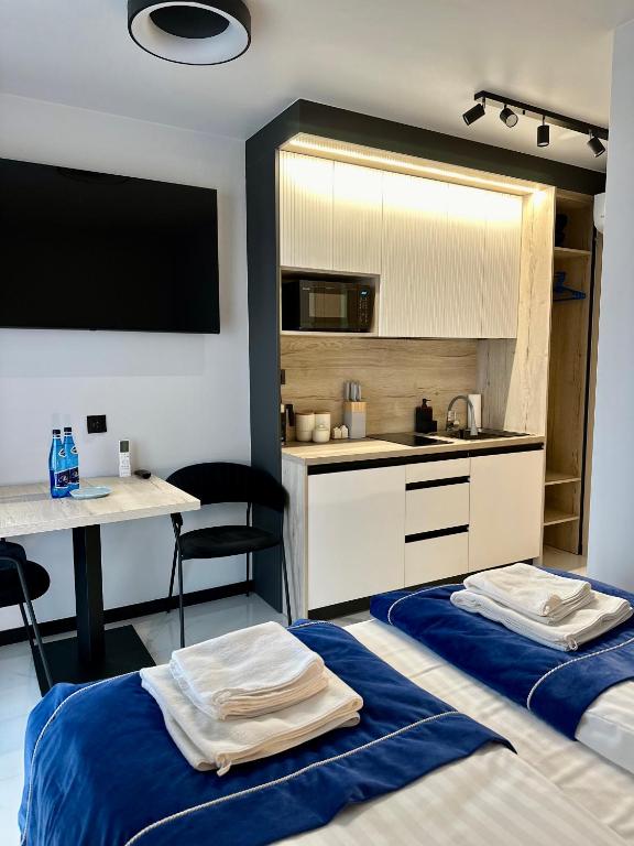 Kuchyňa alebo kuchynka v ubytovaní Cobalt Apartments