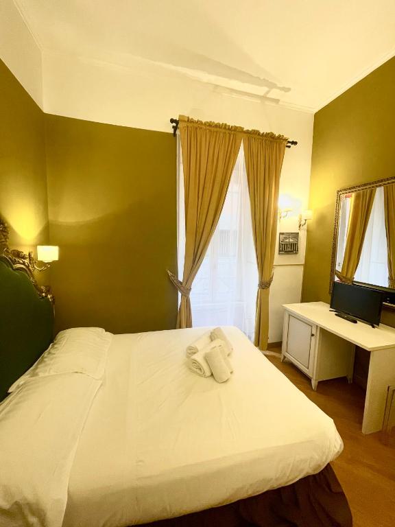 Postel nebo postele na pokoji v ubytování DCBoutiqueHotel
