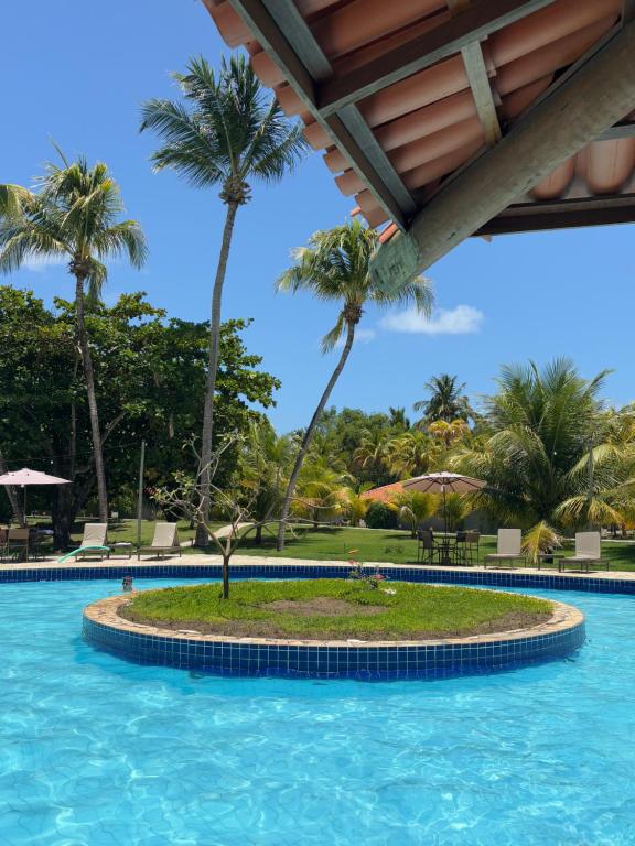 A piscina em ou perto de Angá Beach Hotel