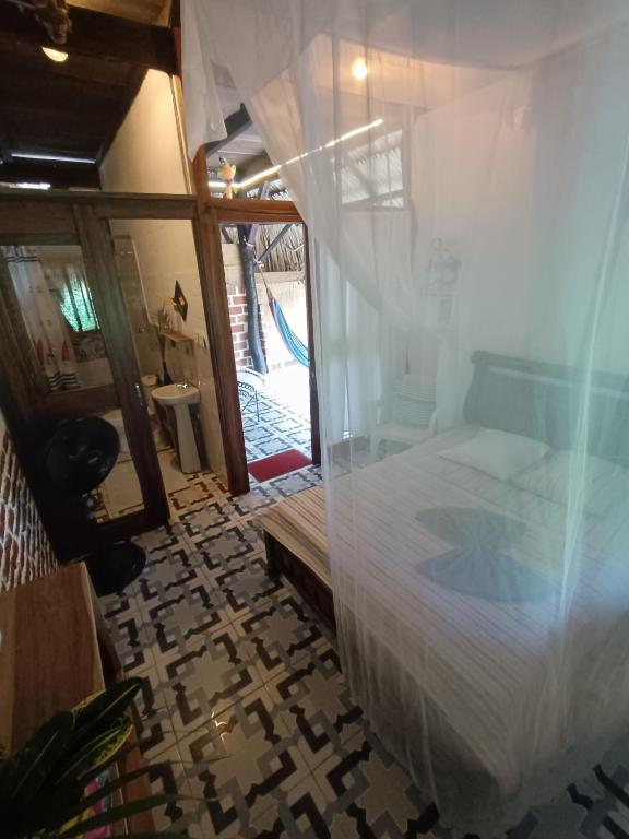 Postel nebo postele na pokoji v ubytování El Paraiso de Carmen