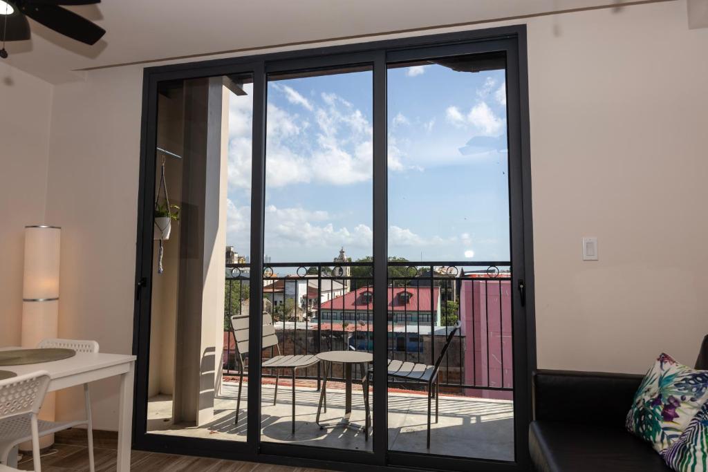 Balkón nebo terasa v ubytování Cozy Apartment Pool Coworking