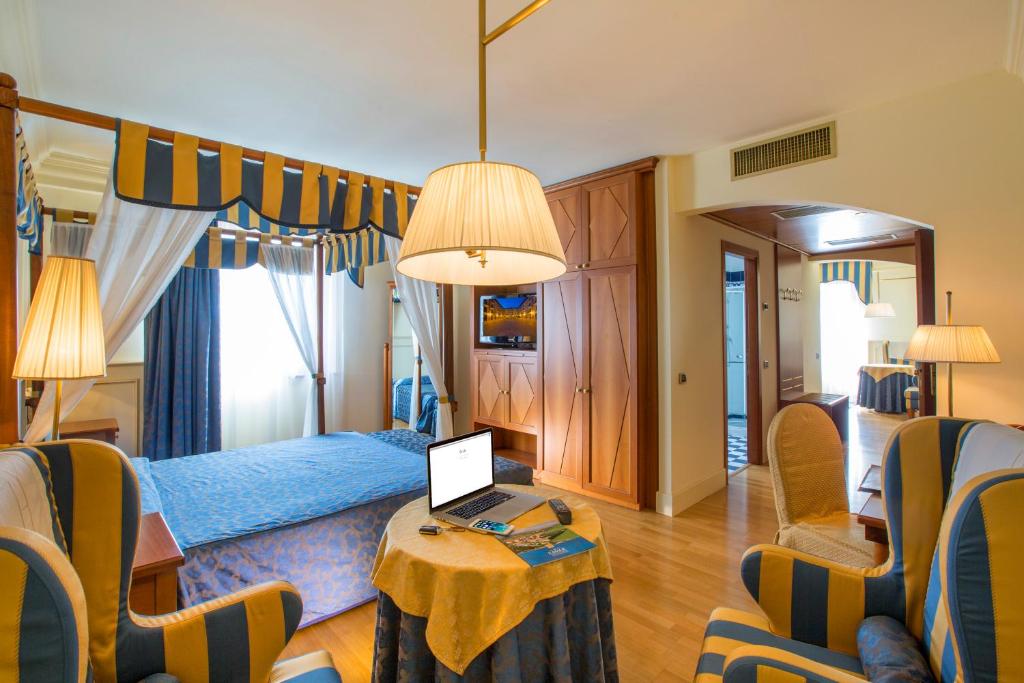 Postel nebo postele na pokoji v ubytování Hotel Casale