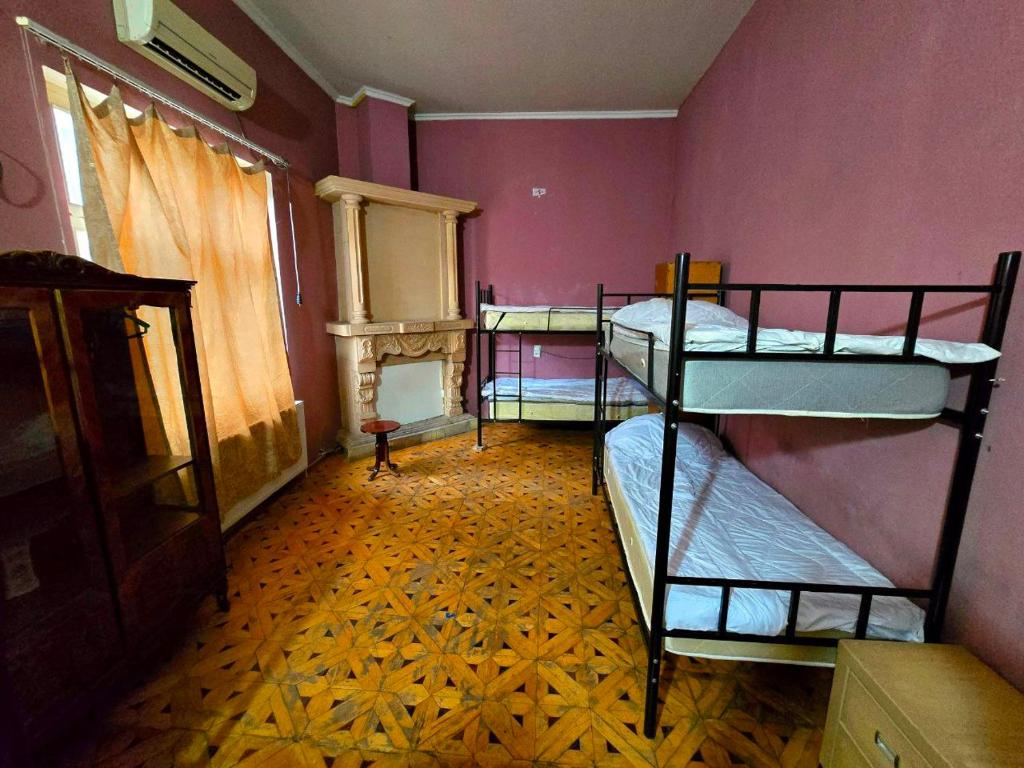 Postel nebo postele na pokoji v ubytování Colors Hostel