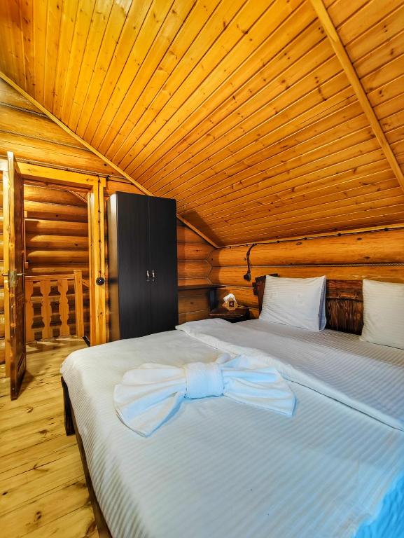 Postel nebo postele na pokoji v ubytování Sonat Resort