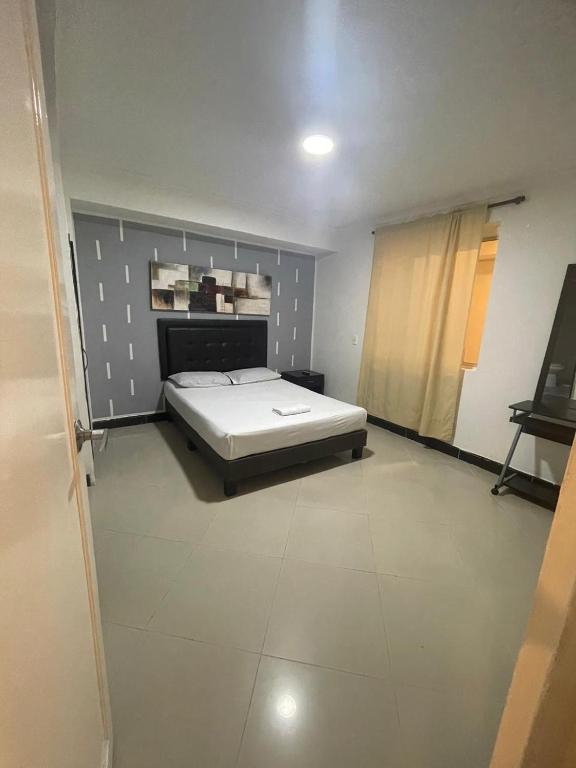Postel nebo postele na pokoji v ubytování Hotel Villa Real